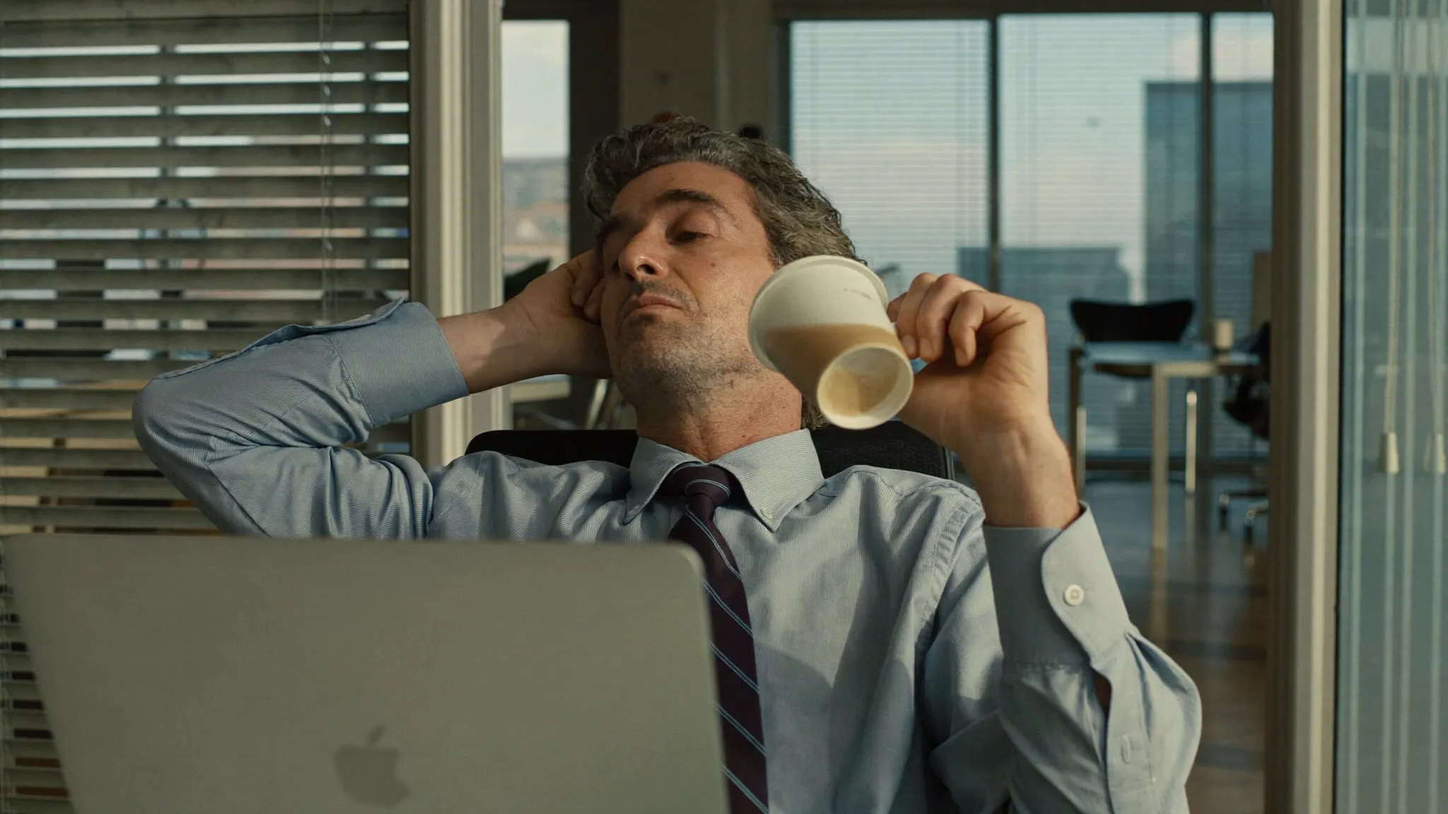 Mid afternoon at the desk, hand over the eyes